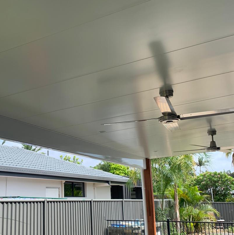 Outdoor ceiling fans on a covered patio